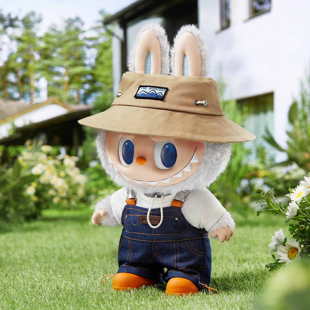 Labubu the Monster in explorer attire, showcasing rustic charm in a garden setting, perfect for collectors.