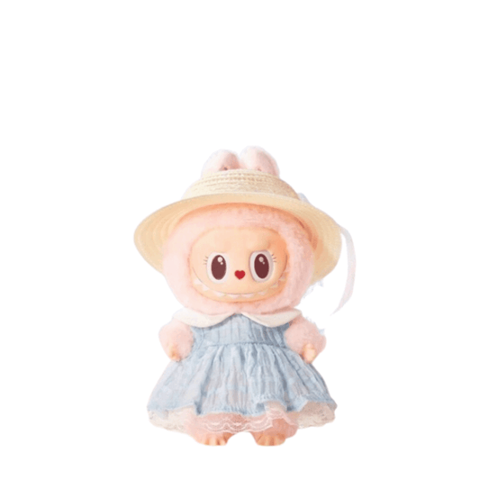 Cute plush doll in a blue dress and straw hat, featuring bunny ears and big expressive eyes.